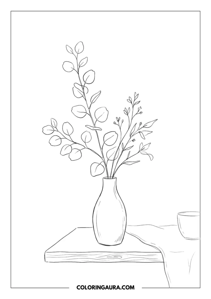 Line art coloring page showing a minimalist vase filled with eucalyptus branches and delicate flowers sitting on a wooden table next to a simple coffee mug.